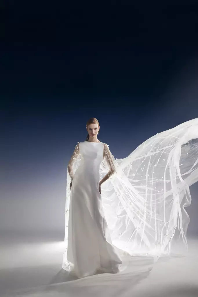 laura-abito-da-sposa-couture-linea-dritta-in-magnolia-di-seta-con-cappa-in-tulle-illusione-ricamata-a-mano-con-petali-di-porcellana-e-perline-peter-langner-1-scaled.jpg